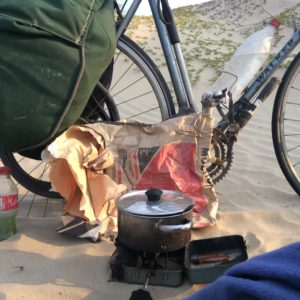 I could usually find a piece of garbage to make a wind screen for the stove.