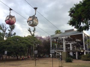 Gondola in Salta leading to a peak overlooking the city.